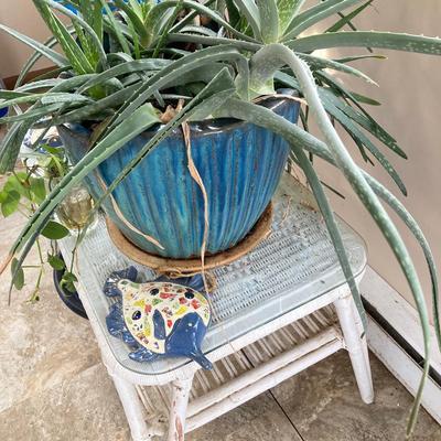 LOT 199: Wicker Accent / Patio Table with Live Aloe Plant, Pottery Fish and More