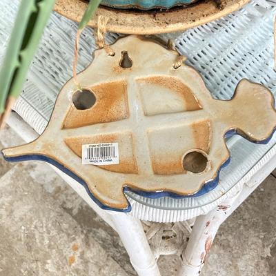 LOT 199: Wicker Accent / Patio Table with Live Aloe Plant, Pottery Fish and More