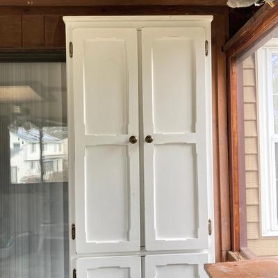 LOT 203: Tall White Storage Cabinet