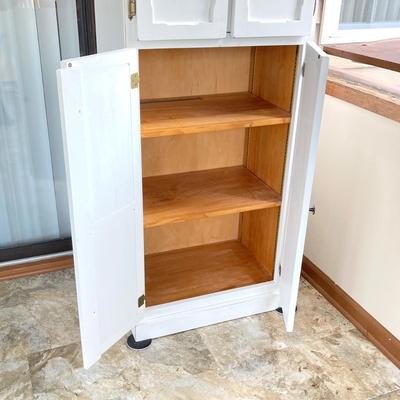 LOT 203: Tall White Storage Cabinet