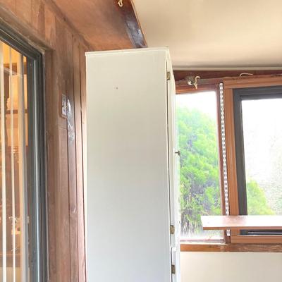 LOT 203: Tall White Storage Cabinet