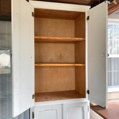 LOT 203: Tall White Storage Cabinet