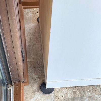 LOT 203: Tall White Storage Cabinet