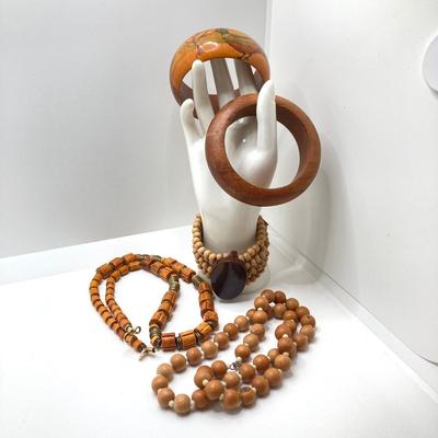 LOT 210: Wooden Jewelry Collection - Bracelets and Necklaces