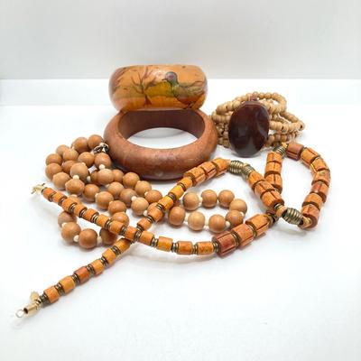 LOT 210: Wooden Jewelry Collection - Bracelets and Necklaces