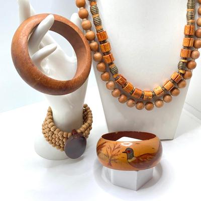 LOT 210: Wooden Jewelry Collection - Bracelets and Necklaces