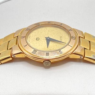 LOT 211: Gucci Swiss Made 3300 L GP 10M Watch