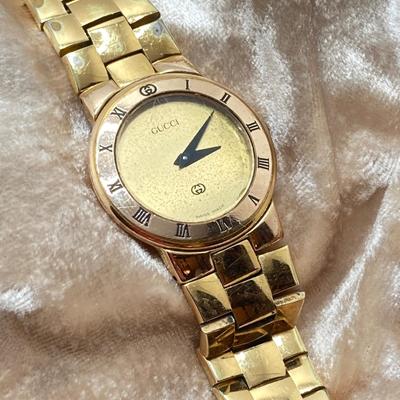 LOT 211: Gucci Swiss Made 3300 L GP 10M Watch