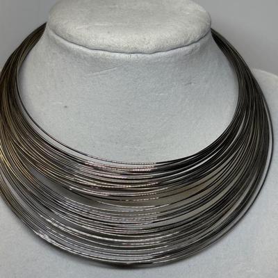 Multi-strand metal wire choker