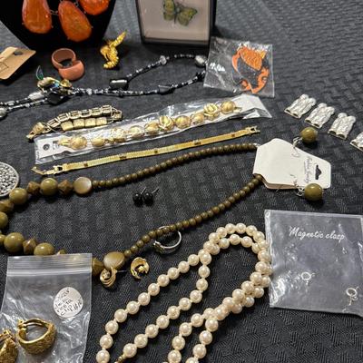 Sale Photo Thumbnail #137: Bracelets, Earrings, Clip and pierced Necklaces.