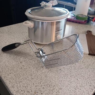 CROCK POT, FRYING BASKET AND A WOOD AND MARBLE CUTTING BOARD