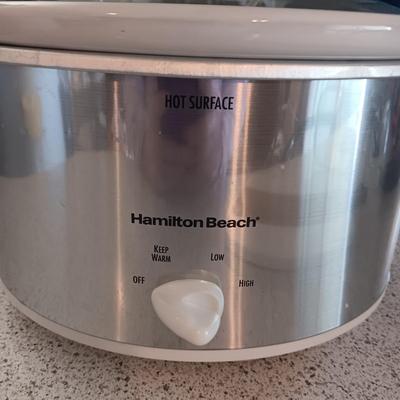 CROCK POT, FRYING BASKET AND A WOOD AND MARBLE CUTTING BOARD