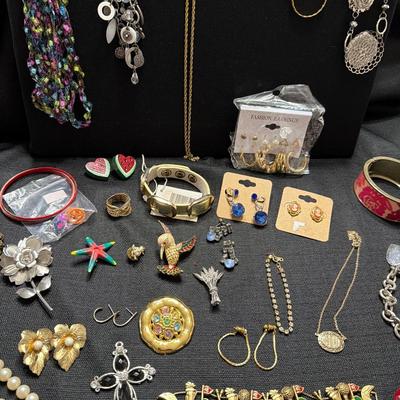 Sale Photo Thumbnail #150: Lia Sophia, Avon, Broaches, Necklaces Earrings, Bracelets and more.