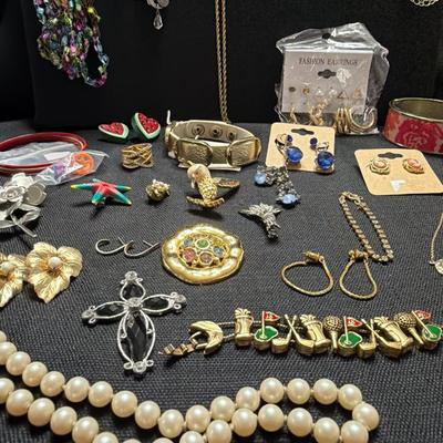 Sale Photo Thumbnail #154: Lia Sophia, Avon, Broaches, Necklaces Earrings, Bracelets and more.