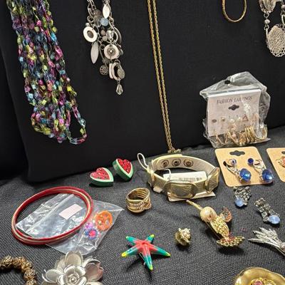 Sale Photo Thumbnail #151: Lia Sophia, Avon, Broaches, Necklaces Earrings, Bracelets and more.