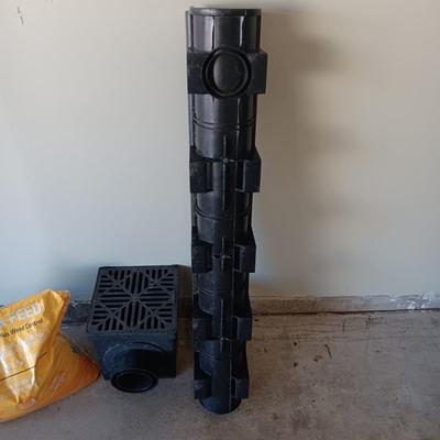 PARTIAL BAG OF WEED & FEED PLUS A IRRIGATION SYSTEM