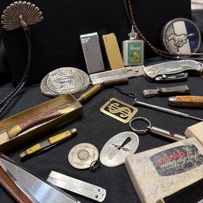 Sale Photo Thumbnail #192: Lighters, Money Clip, Pocket Knives, Bolos Belt buckles