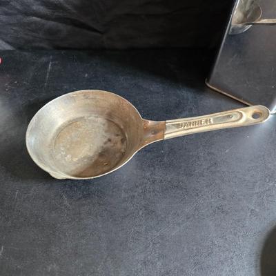 Kitchen items with a retro kitchen flare - Chrome canisters - Glass juicer - aluminum bakeware - Water dippers and more