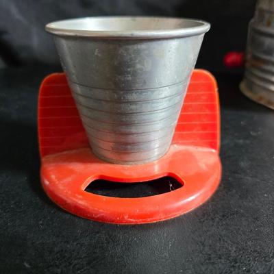 Kitchen items with a retro kitchen flare - Chrome canisters - Glass juicer - aluminum bakeware - Water dippers and more