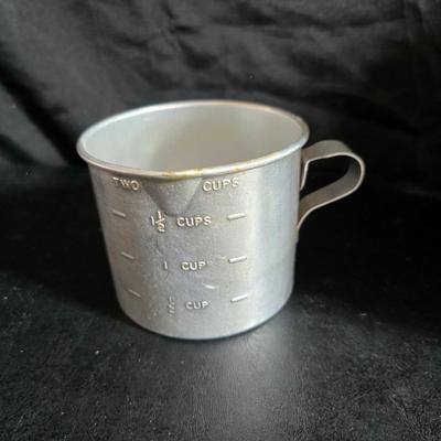 Kitchen items with a retro kitchen flare - Chrome canisters - Glass juicer - aluminum bakeware - Water dippers and more