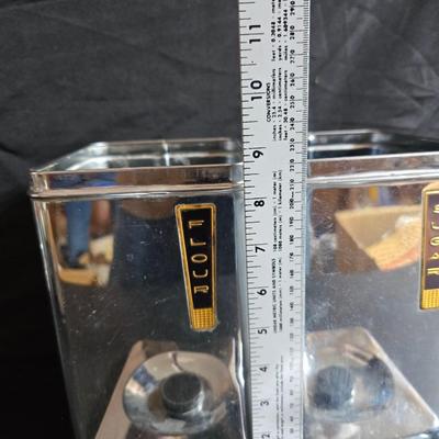 Kitchen items with a retro kitchen flare - Chrome canisters - Glass juicer - aluminum bakeware - Water dippers and more