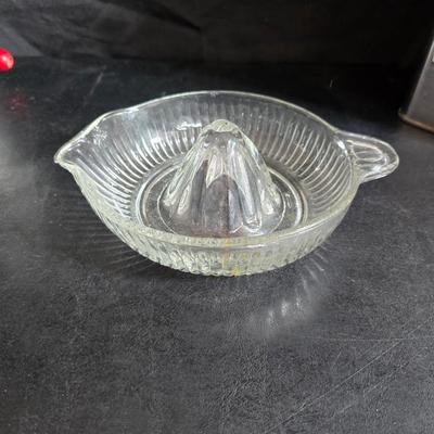 Kitchen items with a retro kitchen flare - Chrome canisters - Glass juicer - aluminum bakeware - Water dippers and more