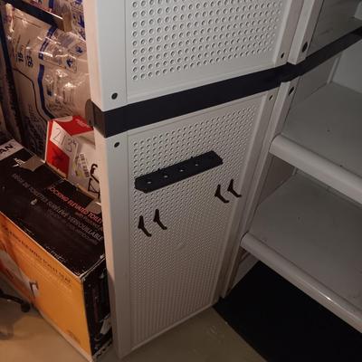 WORKFORCE STORAGE CABINET WITH SHELVES AND PEGBOARD ON THE INSIDE OF DOORS