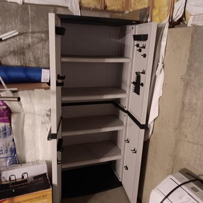 WORKFORCE STORAGE CABINET WITH SHELVES AND PEGBOARD ON THE INSIDE OF DOORS