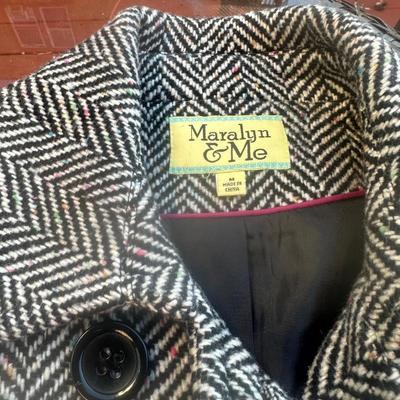 Sale Photo Thumbnail #402: Juniors' single-breasted walker coat in a black and white herringbone pattern.