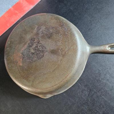 Cast Iron skillet - Ekco Flint cutlery set - rooster hot pads - Weber kettle cover - clock n flame lighters and more