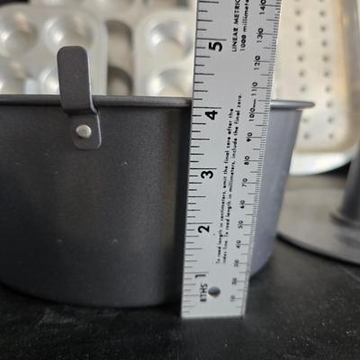 Baking pans - cookie sheets - Whip-o-Matic machine - bundt pans - cupcake pans and more baking items