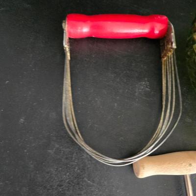 Vintage meat grinder - hand mixer - and an assortment of other kitchen items used on the farm