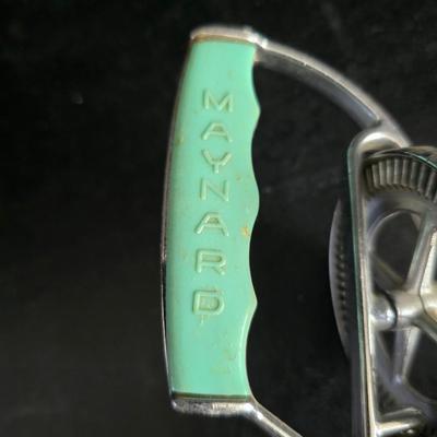 Vintage meat grinder - hand mixer - and an assortment of other kitchen items used on the farm