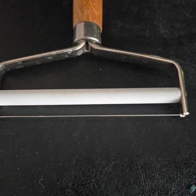 Vintage meat grinder - hand mixer - and an assortment of other kitchen items used on the farm