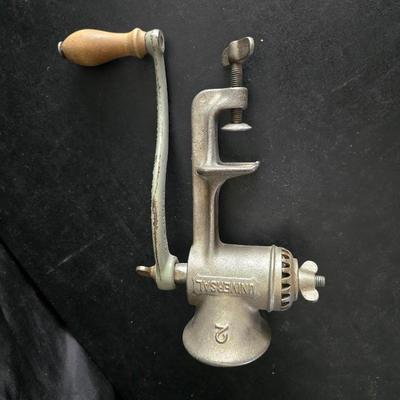 Vintage meat grinder - hand mixer - and an assortment of other kitchen items used on the farm