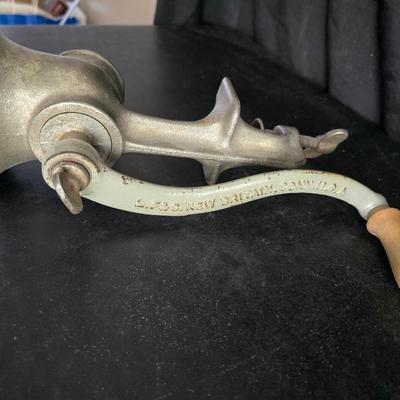 Vintage meat grinder - hand mixer - and an assortment of other kitchen items used on the farm