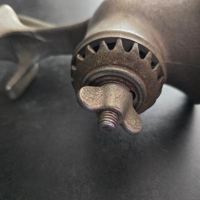 Vintage meat grinder - hand mixer - and an assortment of other kitchen items used on the farm