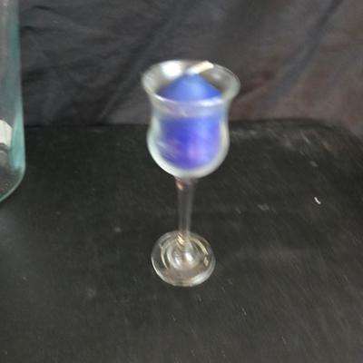 Home decor - large, corked jar - candle holders - and a framed specimen of an Asterope Sapphira butterfly