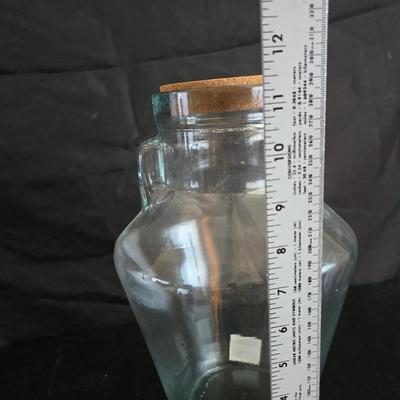 Home decor - large, corked jar - candle holders - and a framed specimen of an Asterope Sapphira butterfly