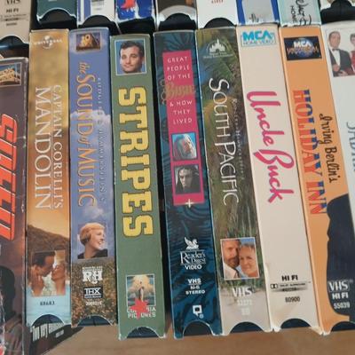 Huge library of VHS tapes = All kinds of GREAT movie titles!