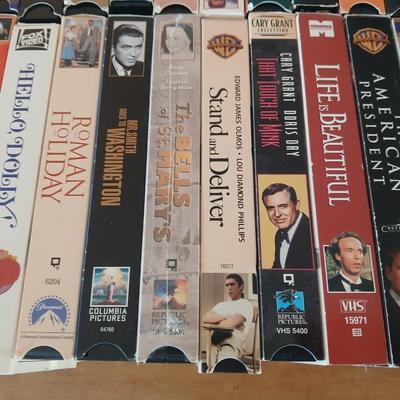 Huge library of VHS tapes = All kinds of GREAT movie titles!