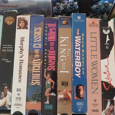 Huge library of VHS tapes = All kinds of GREAT movie titles!