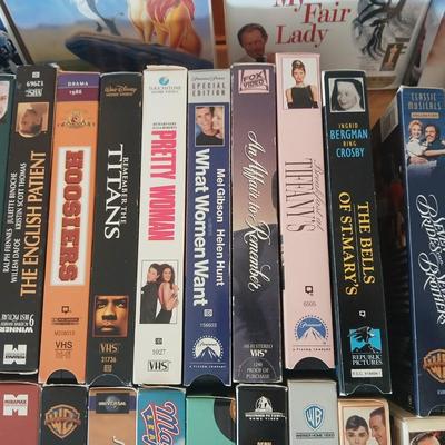 Huge library of VHS tapes = All kinds of GREAT movie titles!