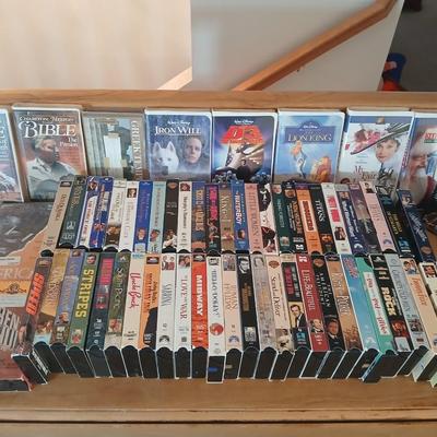 Huge library of VHS tapes = All kinds of GREAT movie titles!