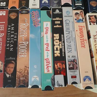 Huge library of VHS tapes = All kinds of GREAT movie titles!