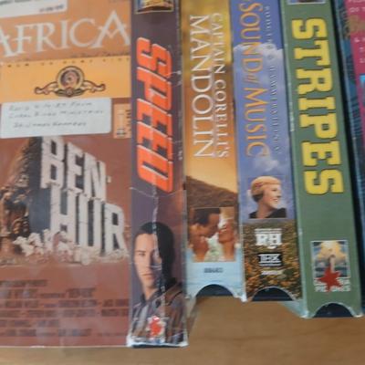 Huge library of VHS tapes = All kinds of GREAT movie titles!