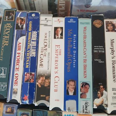 Huge library of VHS tapes = All kinds of GREAT movie titles!