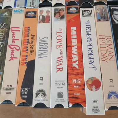Huge library of VHS tapes = All kinds of GREAT movie titles!