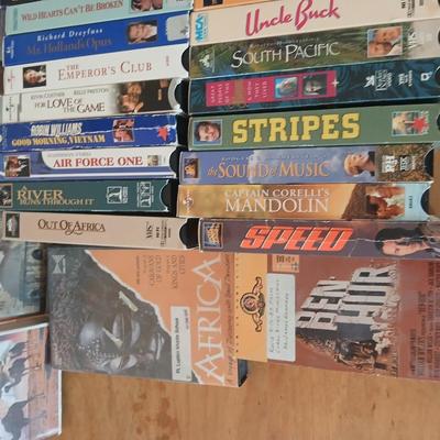 Huge library of VHS tapes = All kinds of GREAT movie titles!