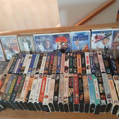 Huge library of VHS tapes = All kinds of GREAT movie titles!